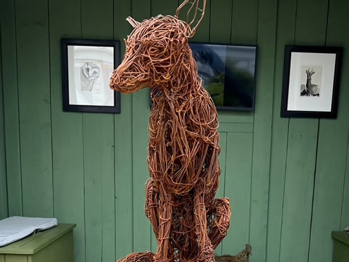 Exhibited at Chelsea Flower Show 2023, life-size fox on a plinth.